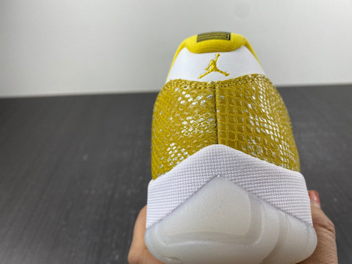 air jordan 11 low wmns “yellow snakeskin” ah7860-107.
