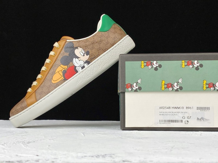 gu ace embroidered low-top sneaker