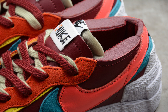 nike blazer low sacai kaws red dm7901-600