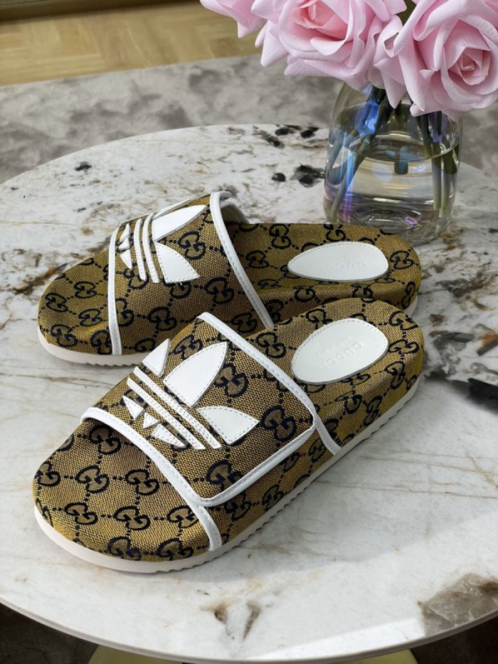 gu x a*d*das sandal