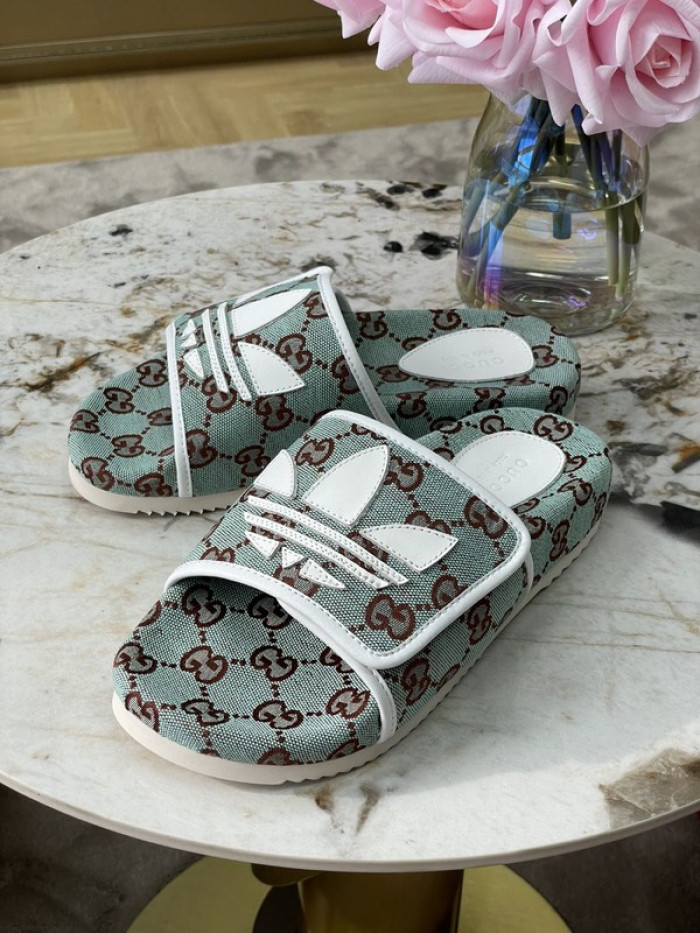 gu x a*d*das sandal
