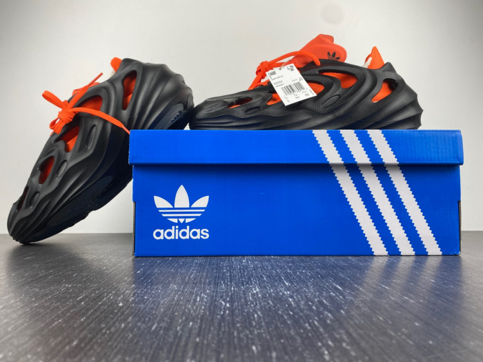 a*d*das adifom q core black impact orange hp6581