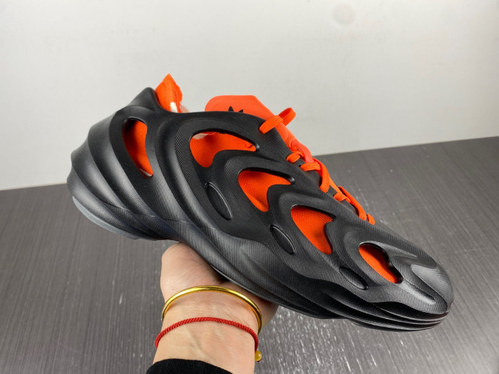a*d*das adifom q core black impact orange hp6581
