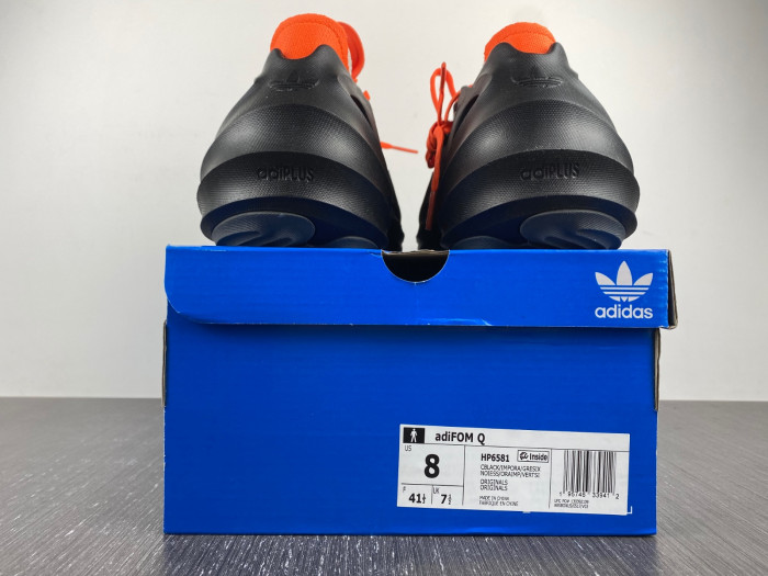 a*d*das adifom q core black impact orange hp6581