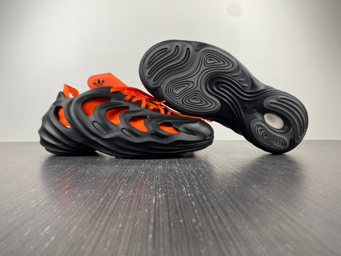 a*d*das adifom q core black impact orange hp6581