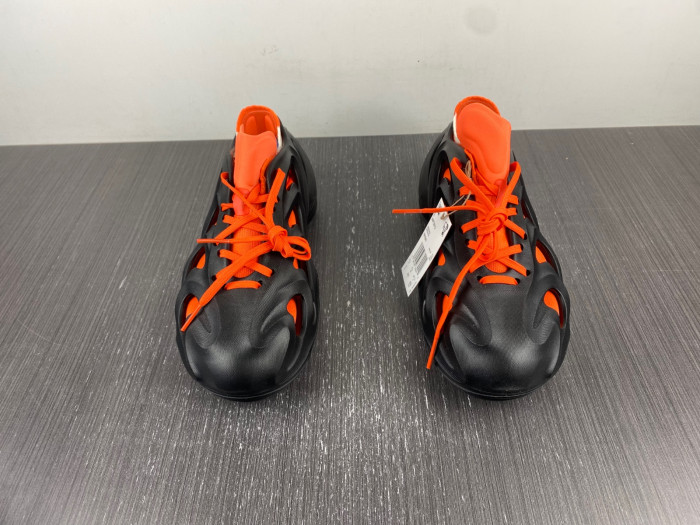 a*d*das adifom q core black impact orange hp6581